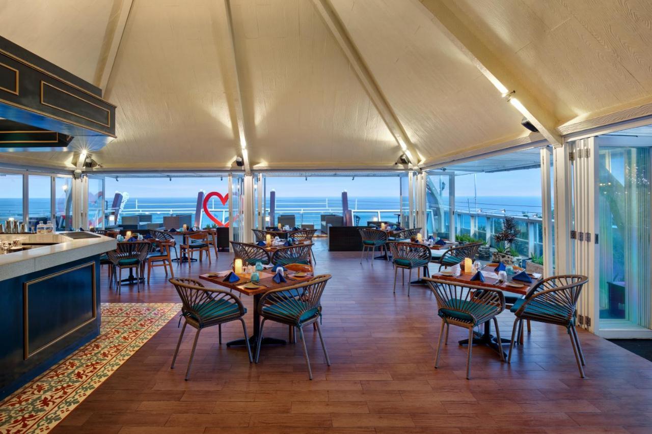 The Kuta Beach Heritage Hotel - Managed By Accor Dış mekan fotoğraf The restaurant