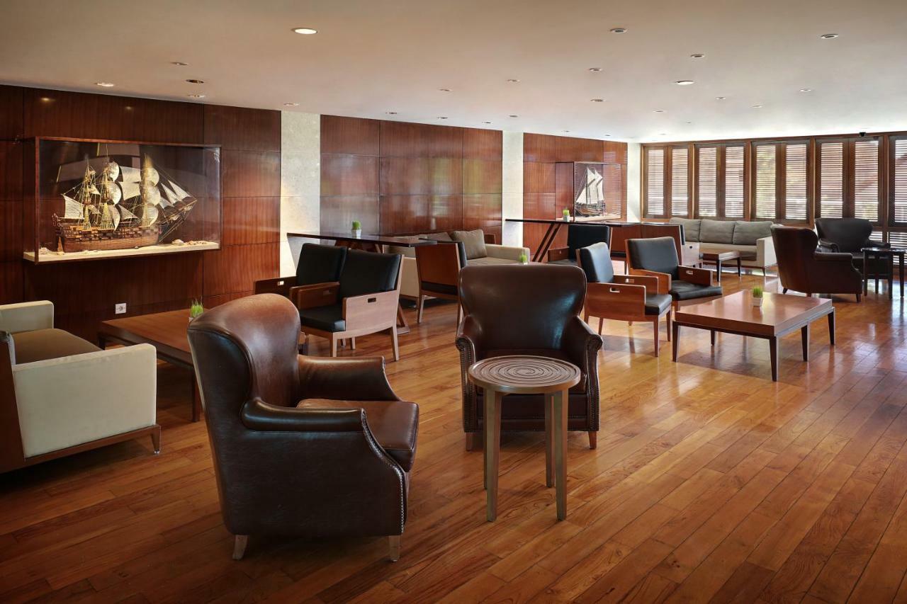The Kuta Beach Heritage Hotel - Managed By Accor Dış mekan fotoğraf The Club lounge at San Francisco International Airport
